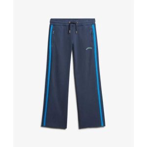 Damskie spodnie dresowe Superdry Essential Logo Straight. Niebieskie spodnie sportowe Superdry, bez wzorów, z dresówki. Za 332,10 zł.