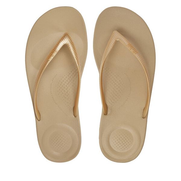 Japonki FitFlop. Żółte klapki FitFlop, bez wzorów, bez obcasa. Za 129,99 zł.