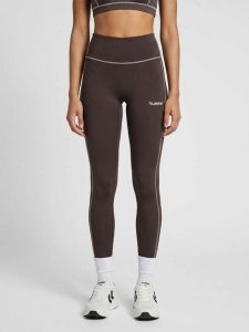 Damskie legginsy Hummel Pulse Retro. Brązowe legginsy Hummel, bez wzorów, z materiału. Za 191,42 zł.