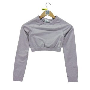 Second life - T-shirt Femme Fitness Yoga Crop Top - Stan dobry. Czerwone t-shirty Gymshark, bez wzorów, sportowe, bez kołnierzyka, bez ramiączek. Za 84,56 zł.