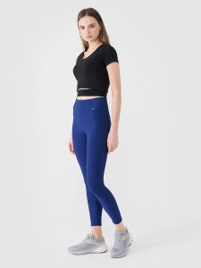 4F Legginsy dzianinowe damskie - granatowe S. Niebieskie legginsy 4f, bez wzorów, z dzianiny, z podwyższonym stanem. W wyprzedaży za 99,99 zł.