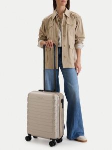 GINO ROSSI Walizka kabinowa GIN-S-002-05-GOLD Złoty. Żółte walizki Gino Rossi, bez wzorów, z materiału. Za 259,99 zł.