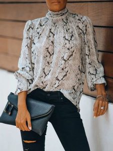 LA Angels Bluzka w kolorze brązowo-kremowym rozmiar: XL. Brązowe bluzki LA Angels, xl, bez wzorów, bez kołnierzyka, bez ramiączek. Za 91,99 zł.