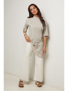 Le Monde du Lin Tunika w kolorze szarobrązowym rozmiar: 34/36. Brązowe tuniki Le Monde du Lin, bez wzorów, z bawełny, z asymetrycznym kołnierzem, bez ramiączek. Za 100,99 zł.