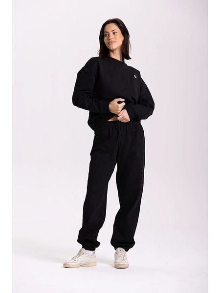 Onamaste Spodnie dresowe "Olga" w kolorze czarnym rozmiar: S/M. Czarne spodnie dresowe Onamaste, m, bez wzorów, z dresówki. Za 178,45 zł.