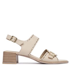 Sandały Caprice. Białe sandały Caprice, bez wzorów, bez obcasa, na słupku, bez zapięcia. Za 339,99 zł.