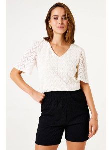 Garcia Koszulka w kolorze niebieskim rozmiar: L. Brązowe bluzki Garcia, l, bez wzorów, z koronki, bez kołnierzyka, bez ramiączek. Za 122,67 zł.