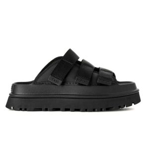 Damskie japonki klapki W GOLDENGLOW SLIDE. Czarne klapki Ugg, bez wzorów, z materiału, bez obcasa. Za 497,25 zł.
