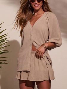 Milan Kiss Bluzka w kolorze beżowym rozmiar: S. Brązowe bluzki Milan Kiss, s, bez wzorów, z bawełny, bez kołnierzyka, bez ramiączek. Za 165,71 zł.