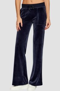 JUICY COUTURE Granatowe spodnie dresowe damskie Layla Low Rise, Rozmiar XS. Niebieskie spodnie dresowe Juicy Couture, s, bez wzorów, z dresówki. Za 499,99 zł.