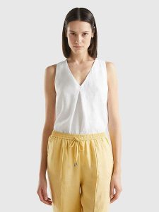 Benetton Lniana bluzka w kolorze białym rozmiar: XS. Białe bluzki Benetton, xs, bez wzorów, ze lnu, bez kołnierzyka, bez ramiączek. Za 96,60 zł.