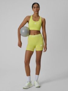 4F Legginsy krótkie treningowe damskie - żółte XL. Żółte legginsy 4f, bez wzorów, z materiału, z podwyższonym stanem, krótkie. Za 99,99 zł.