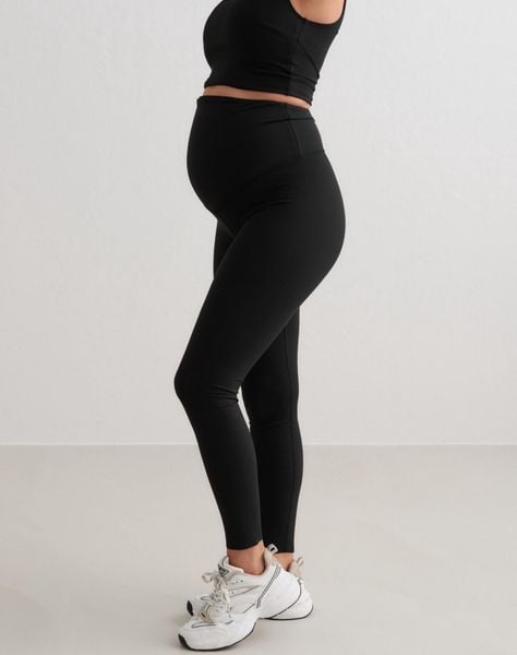 Damskie legginsy ciążowe, krótsze, wysoki stan, squat proof Sense czarne. Czarne legginsy AIM'N, bez wzorów, z dzianiny, z podwyższonym stanem, krótkie. Za 297,00 zł.
