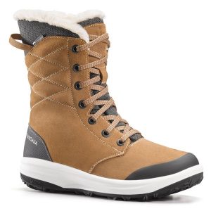 Buty turystyczne damskie śniegowce Quechua SH900 skóra wodoodporne. Czarne buty trekkingowe QUECHUA, ze skóry, przed kolano, bez zapięcia. W wyprzedaży za 299,99 zł.