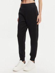 Guess Spodnie dresowe W5YB11 KBYE2 Czarny Regular Fit. Czarne spodnie dresowe Guess, xl, z aplikacjami, z dresówki. Za 279,99 zł.