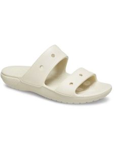 Crocs Klapki "Classic" w kolorze kremowym rozmiar: 46/47. Brązowe klapki Crocs, bez wzorów, z otwartym noskiem, bez obcasa. Za 81,45 zł.