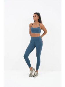 Onamaste Legginsy sportowe "Geneva" w kolorze niebieskim rozmiar: L/XL. Niebieskie legginsy Onamaste, bez wzorów, z materiału. Za 126,99 zł.