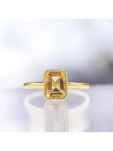 DIAMOND & CO Złoty pierścionek "Classy" z cytrynem rozmiar: 48. Brązowe pierścionki Diamond & Co, z cytrynem, złote. Za 953,31 zł.