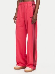 Adidas Spodnie dresowe Firebird Loose Tracksuit KW0228 Różowy Loose Fit. Czerwone spodnie dresowe ADIDAS, s, bez wzorów, z dresówki. Za 299,99 zł.
