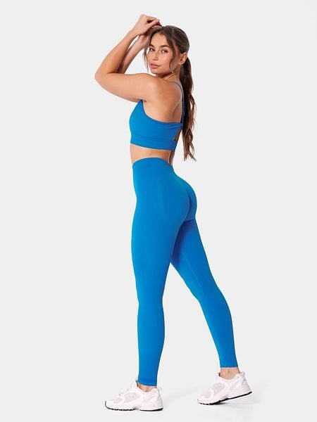 Carpatree Legginsy sportowe "Eris" w kolorze niebieskim rozmiar: L. Niebieskie legginsy Carpatree, l, bez wzorów, z podwyższonym stanem, outdoorowe. Za 119,95 zł.