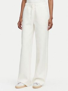 Guess Spodnie dresowe V6YB10 K4295 Kremowy Regular Fit. Białe spodnie dresowe Guess, xl, z aplikacjami, z dresówki. Za 344,99 zł.
