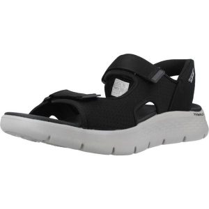 Sandały Skechers Model Slip-ins Go Walk Flex Kolor Czarny. Czarne sandały Skechers, bez wzorów, z tkaniny, bez obcasa, bez zapięcia. Za 279,99 zł.