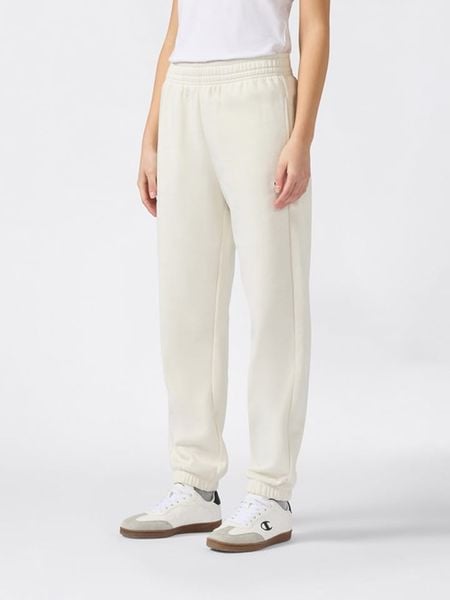 Champion Spodnie dresowe w kolorze kremowym rozmiar: S. Brązowe spodnie dresowe Champion, s, bez wzorów, z bawełny. Za 100,28 zł.