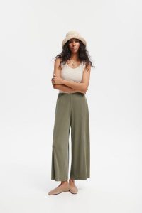 SPODNIE KATE OLIWKOWE XL - Flawless. Zielone spodnie z wysokim stanem Flawless, bez wzorów, z materiału, z podwyższonym stanem. Za 349,00 zł.