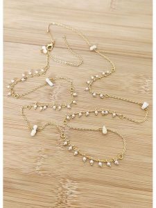 La Asena Pozłacany naszyjnik - dł. 65 cm rozmiar: onesize. Białe naszyjniki La Asena, z perłą, pozłacane. Za 52,99 zł.