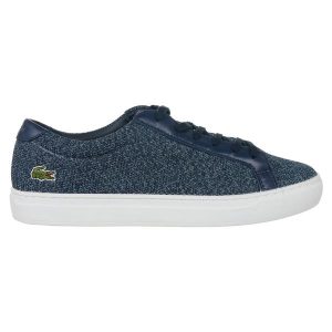 Buty lifestylowe Lacoste L 12 12 317 W 7-34CAW0017003 białe niebieskie. Białe trampki bez wzorów, z materiału, bez zapięcia. Za 544,84 zł.
