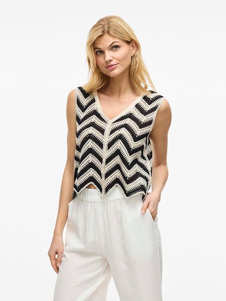 Vila Kamizelka w kolorze biało-czarnym rozmiar: S. Białe kamizelki Vila, s, bez wzorów, bez kołnierzyka, bez ramiączek, bez kaptura. Za 61,17 zł.