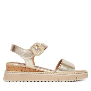 Sandały Tamaris. Żółte sandały Tamaris, bez wzorów, bez obcasa, na koturnie, bez zapięcia. Za 369,99 zł.