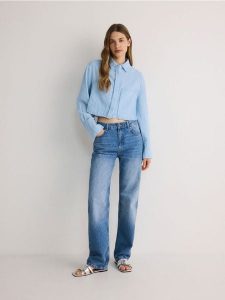 Muślinowa koszula - jasnoniebieski. Niebieskie koszule Reserved, l, bez wzorów, z bawełny, bez kołnierzyka, bez ramiączek. W wyprzedaży za 35,99 zł.