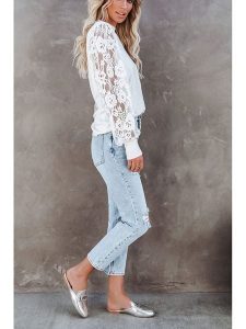 Milan Kiss Bluzka w kolorze białym rozmiar: S. Białe bluzki Milan Kiss, s, bez wzorów, z koronki, bez kołnierzyka, bez ramiączek. Za 174,43 zł.