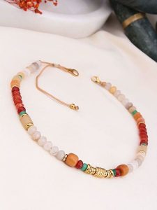 Charlize Pozłacany naszyjnik z kamieniami ozdobnymi i agatami - dł. 45 cm rozmiar: onesize. Czerwone naszyjniki Charlize, z agatem, pozłacane. Za 82,83 zł.