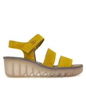 Sandały Fly London. Żółte sandały Fly London, bez wzorów, bez obcasa, na koturnie, bez zapięcia. Za 547,99 zł.