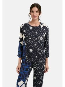 Milano Italy Bluzka w kolorze granatowym rozmiar: 38. Niebieskie bluzki Milano Italy, bez wzorów, z wiskozy, bez kołnierzyka, bez ramiączek. Za 173,99 zł.