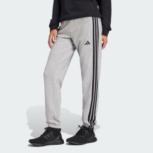 Spodnie Essentials 3-Stripes French Terry Cuffed. Czarne spodnie dresowe ADIDAS, s, bez wzorów, z materiału, na fitness i siłownię. Za 219,00 zł.
