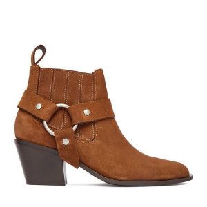 Botki Badura. Brązowe botki Badura, bez wzorów, bez obcasa, na słupku, bez zapięcia. Za 429,99 zł.