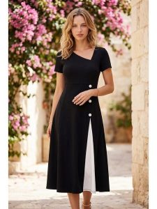 SOULSHAE Sukienka w kolorze czarnym rozmiar: L/XL. Czarne sukienki SOULSHAE, l, bez wzorów, z wiskozy, bez kołnierzyka, bez ramiączek, midi, rozkloszowane. Za 159,95 zł.