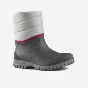 Buty turystyczne śniegowce damskie Quechua SH100 Warm Mid wodoodporne. Czerwone buty trekkingowe QUECHUA, bez zapięcia. Za 79,99 zł.