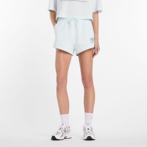 Spodenki damskie New Balance WB61Y80AAAW – miętowe. Zielone szorty New Balance, bez wzorów, z bawełny, klasyczne. Za 199,99 zł.