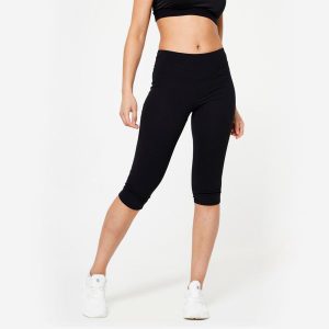 Krótkie legginsy fitness damskie Domyos slim. Czarne legginsy DOMYOS, bez wzorów, z bawełny, długie. Za 39,99 zł.