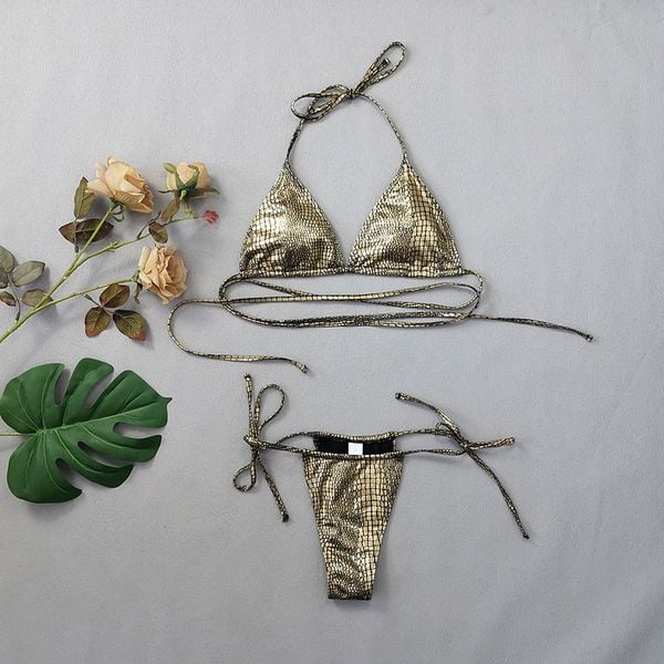 Bikini z wzorem zwierzęcym odporne na chlor i słoną wodę Lenke. Żółte bikini Intica, bez wzorów, z materiału. Za 139,00 zł.