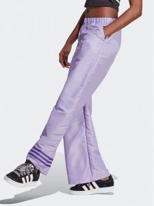 Adidas Spodnie dresowe Wide Leg Tracksuit Bottoms IC5443 Fioletowy. Fioletowe spodnie dresowe ADIDAS, m, bez wzorów, z dresówki. Za 349,99 zł.