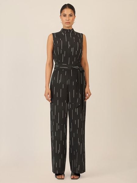 APART Kombinezon w kolorze czarno-kremowym rozmiar: 38. Czarne kombinezony Apart, bez wzorów, z tkaniny, bez kołnierzyka, bez ramiączek. Za 232,23 zł.