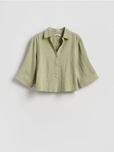 Koszula z wiskozą - jasnozielony. Zielone koszule Reserved, l, bez wzorów, z tkaniny, bez kołnierzyka, bez ramiączek. Za 99,99 zł.