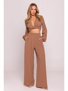 Made of emotion Spodnie w kolorze jasnobrązowym rozmiar: M. Brązowe spodnie z wysokim stanem Made Of Emotion, bez wzorów, z materiału, z podwyższonym stanem. Za 147,99 zł.