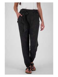 Alife and kickin Spodnie "AliceAK" w kolorze czarnym rozmiar: S. Czarne spodnie z wysokim stanem Alife and Kickin, bez wzorów, z materiału, z podwyższonym stanem. Za 105,45 zł.