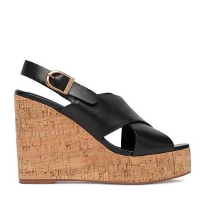 Sandały Badura. Czarne sandały Badura, bez wzorów, bez obcasa, na koturnie, bez zapięcia. Za 229,99 zł.